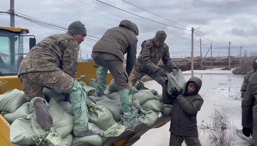 Soldiers from Tokayev's security arrived to help rescuers fight floods